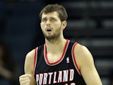 Joel Freeland #19 of the Portland Trail Blazers reacts to a basket against the Charlotte Bobcats during their game at Time Warner Cable Arena on December 3, 2012