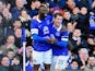 Everton's Lacina Traore celebrates with teammate Ross Barkley after scoring the opening goal against Swansea during their FA Cup fifth round match on February 9, 2014