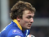 Lee Smith of Leeds runs with the ball during the pre season friendly match between Leeds Rhinos and Wakefield Trinity Wildcats at Headingley Carnegie Stadium on January 1, 2011