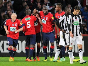 Lille through after shootout win