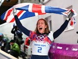 Lizzy Yarnold of Great Britain celebrates winning the gold medal during the Women's Skeleton on Day 7 of the Sochi 2014 Winter Olympics at Sliding Center Sanki on February 14, 2014