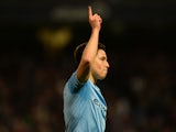 Manchester City's French midfielder Samir Nasri celebrates scoring their second goal during the English FA Cup fifth round football match between Manchester City and Chelsea at The Etihad Stadium in Manchester, northwest England on February 15, 2014