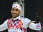 Gold medalist France's Martin Fourcade celebrates his win in the Men's Biathlon 12,5 km Pursuit at the Laura Cross-Country Ski and Biathlon Center during the Sochi Winter Olympics on February 10, 2014
