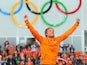 Gold medalist Michel Mulder of the Netherlands celebrates on the podium during the flower ceremony for the Men's 500m Speed Skating eventduring day 3 of the Sochi 2014 Winter Olympics on February 10, 2014