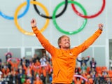 Gold medalist Michel Mulder of the Netherlands celebrates on the podium during the flower ceremony for the Men's 500m Speed Skating eventduring day 3 of the Sochi 2014 Winter Olympics on February 10, 2014