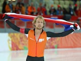 Gold medalist Michel Mulder of the Netherlands celebrates after the Men's 500 m Race 2 of 2 Speed Skating event during day three of the Sochi 2014 Winter Olympics at Adler Arena Skating Center on February 10, 2014