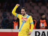 Gonzalo Higuain of Napoli celebrates after scoring goal 2-0 during the TIM Cup match between SSC Napoli and AS Roma at Stadio San Paolo on February 12, 2014