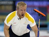 Sweden's Niklas Edin reacts after throwing his stone during the men's curling round robin session 3 match between Sweden and Canada at the Ice Cube curling centre in Sochi on February 11, 2014