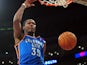 Kevin Durant of the Oklahoma City Thunder scores off a slam dunk against the Los Angeles Lakers during their NBA game at Staples Center on February 13, 2014