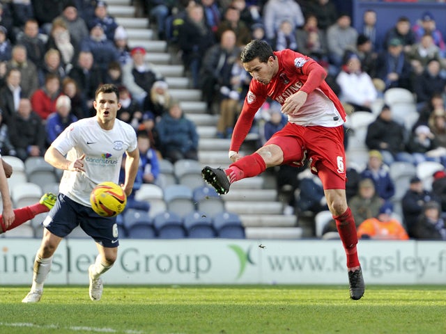 Mathieu Baudry of Leyton Orient scores the first goal of the game for his side during the Sky Bet League One match between Preston North End and Leyton Orient at Deepdale on February 15, 2014