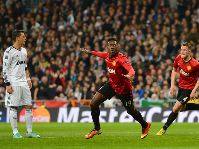 Danny Welbeck of Manchester United celebrates scoring the opening goal during the UEFA Champions League Round of 16 first leg match between Real Madrid and Manchester United at Estadio Santiago Bernabeu on February 13, 2013