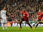Danny Welbeck of Manchester United celebrates scoring the opening goal during the UEFA Champions League Round of 16 first leg match between Real Madrid and Manchester United at Estadio Santiago Bernabeu on February 13, 2013