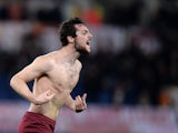 AS Roma's forward Mattia Destro celebrates after scoring a goal during the serie A Italian football match between AS Roma and Sampdoria at Rome's Olympic Stadium on February 16, 2014