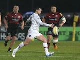 Ryan Lamb of Leicester kicks the ball upfield during the Aviva Premiership match between Saracens and Leicester Tigers at Allianz Park on December 21, 2013