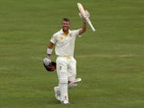 David Warner of Australia celebrates after reaching 100 runs during day three of the First Test match between South Africa and Australia on February 14, 2014