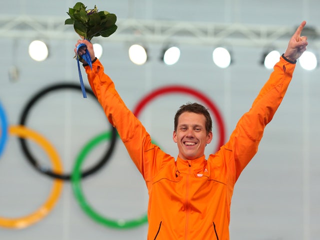 Gold medalist Stefan Groothuis of the Netherlands celebrates during the flower ceremony for the Men's 1000m Speed Skating event during day 5 of the Sochi 2014 Winter Olympics at at Adler Arena Skating Center on February 12, 2014