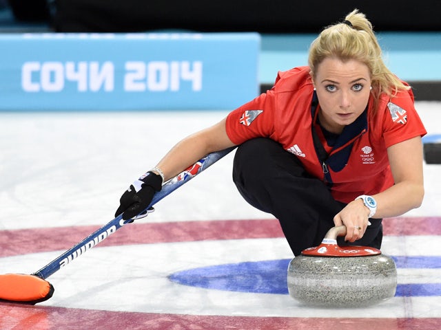 Great Britain's Anna Sloan trows the stone during the 2014 Sochi winter olympics women's curling round robin session 3 match against the US at the Ice Cube curling centre in Sochi on February 11, 2014