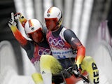 Tobias Wendl and Tobias Arlt of Germany celebrate after completing their second run during the Men's Luge Doubles on Day 5 of the Sochi 2014 Winter Olympics at Sliding Center Sanki on February 12, 2014