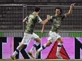 Bastia's French defender Francois Joseph Modesto celebrates with teammates after scoring a goal during the French L1 football match Toulouse against Bastia on February 11, 2014