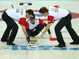 The USA compete in the Curling Men's Round Robin match between USA and Denmark during day five of the Sochi 2014 Winter Olympics at Ice Cube Curling Center on February 12, 2014