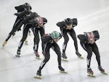 Members of the US speed skating team train wearing their new black suits on the No 2 training rink next to Adler speed skating arena during the Sochi Winter Olympics on January 31, 2014