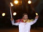 Vladislav Tretyak runs to light the Olympic cauldron at the opening ceremony of the 2014 Winter Olympics on February 7, 2014