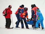 Yuki Tsubota of Canada is carried off the course after a crash in the Freestyle Skiing Women's Ski Slopestyle Finals on day four of the Sochi 2014 Winter Olympics on February 11, 2014