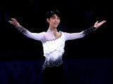 Yuzuru Hanyu of Japan celebrates after winning the gold medal in the Figure Skating Men's Free Skating on day seven of the Sochi 2014 Winter Olympics at Iceberg Skating Palace on February 14, 2014