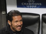 Diego Simeone looks on before the UEFA Champions League Round of 16 match between AC Milan and Club Atletico de Madrid at Stadio Giuseppe Meazza on February 19, 2014
