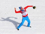 Gold medalist Alexander Legkov of Russia celebrates during the flower ceremony for the Men's 50 km Mass Start Free during day 16 of the Sochi 2014 Winter Olympics at Laura Cross-country Ski & Biathlon Center on February 23, 2014