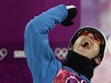 Gold Medallist, Belarus' Anton Kushnir celebrates in the Men's Freestyle Skiing Aerials finals at the Rosa Khutor Extreme Park during the Sochi Winter Olympics on February 17, 2014