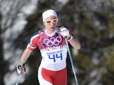 Norway's Astrid Uhrenholdt Jacobsen competes in the Women's Cross-Country Skiing 10km Classic at the Laura Cross-Country and Biathlon Center during the Sochi Winter Olympics February 13, 2014