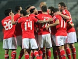 Benfica players celebrates the opening goal against Paok Thessaloniki during their Europa League match on February 20, 2014