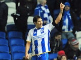 Brighton & Hove Albion's Argentine striker Leonardo Ulloa celebrates after scoring his team's first goal during the English FA Cup fifth round football match between Brighton & Hove Albion and Hull City at The American Express Community Stadium in Brighto