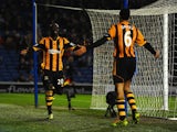 Yannick Sagbo of Hull City celebrates scoring their first goal with Curtis Davies of Hull City during the FA Cup fifth round match between Brighton & Hove Albion and Hull City at Amex Stadium on February 17, 2014 