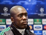 AC Milan's Dutch coach Clarence Seedorf gives a press conference, on the eve of the Champions League football match between AC Milan and Atletico Madrid , on February 18, 2014