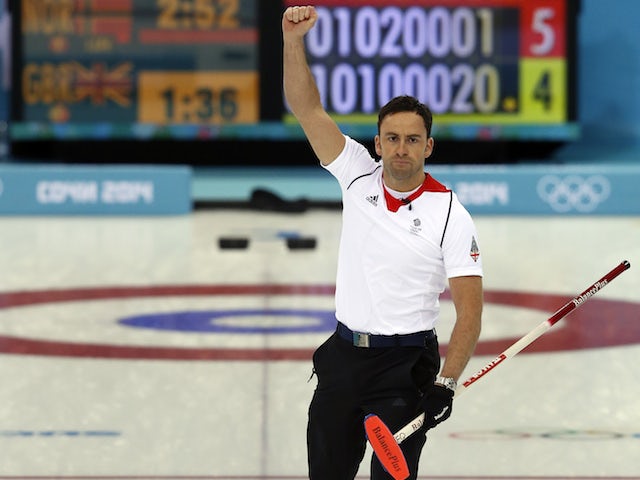 Great Britain's Skip David Murdoch reacts to scoring 2 points with the final stone to win the game during the men's curling tie-breaker match between Great Britain and Norway at the Sochi Winter Olympics on February 18, 2014