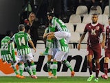 Real Betis' Didac Vila celebrates with teammates after scoring against Rubin Kazan during their Europa League match on February 20, 2014