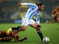 Duane Holmes of Huddersfield Town in action during the Capital One Cup third round match between Hull City and Huddersfield Town at the KC Stadium on September 24, 2013