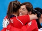 Eve Muirhead and Vicki Adams of Great Britain celebrate as they win the bronze medal during the Bronze medal match against Switzerland on Febraury 20, 2014