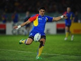 Florin Vlaicu of Romania clears the ball downfield during the IRB 2011 Rugby World Cup Pool B match between Georgia and Romania at Arena Manawatu on September 28, 2011