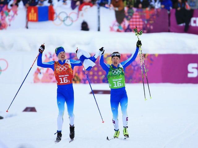Sami Jauhojaervi and Iivo Niskanen of Finland after they won the gold medal in the Men's Team Sprint Classic Final during day 12 of the 2014 Sochi Winter Olympics at Laura Cross-country Ski & Biathlon Center on February 19, 2014