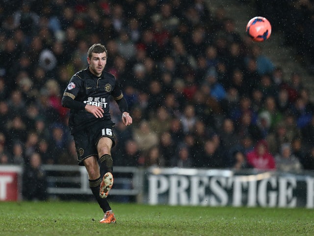 James McArthur of Wigan Athletic in action during the FA Cup with Budweiser Third Round Replay between Milton Keynes Dons and Wigan Athletic at Stadium mk on January 14, 2014