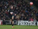 James McArthur of Wigan Athletic in action during the FA Cup with Budweiser Third Round Replay between Milton Keynes Dons and Wigan Athletic at Stadium mk on January 14, 2014