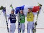 Silver Medallist, France's Arnaud Bovolenta; Gold Medallist, France's Jean Frederic Chapuis; and Bronze Medallist, France's Jonathan Midol celebrate at the Men's Freestyle Skiing cross on February 20, 2014