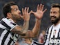 Juventus' Argentine forward Carlos Tevez celebrates after scoring during the Italian Serie A football match between Juventus and Torino on February 23, 2014