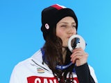 Silver medalist Kelsey Serwa of Canada celebrates during the medal ceremony for the Women's Ski Cross on day fourteen of the Sochi 2014 Winter Olympics at Medals Plaza on February 21, 2014