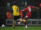 Jonathan Tehoue of Leyton Orient shoots to score the equaliser during the FA Cup sponsored by E.ON 5th Round match between Leyton Orient and Arsenal at the Matchroom Stadium on February 20, 2011