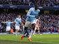 Yaya Toure of Manchester City celebrates scoring the opening goal during the Barclays Premier League match between Manchester City and Stoke City at the Etihad Stadium on February 22, 2014