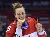 Canada's Marie-Philip Poulin celebrates with her Gold medal during the Women's Ice Hockey Medal Ceremony at the Bolshoy Ice Dome plaza during the Sochi Winter Olympics on February 20, 2014